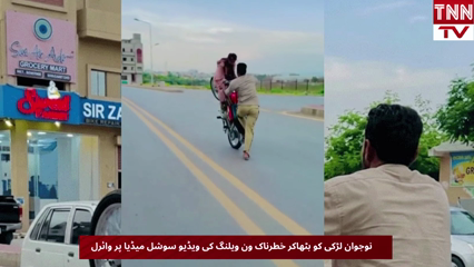 Dangerous Wheelie Stunt with Young Woman Goes Viral on Social Media